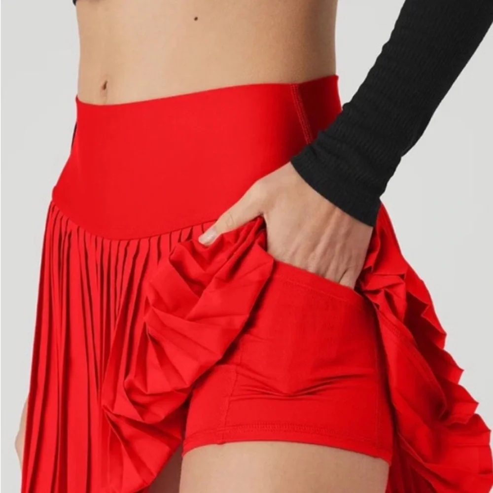 Red pleated also tennis skirt
